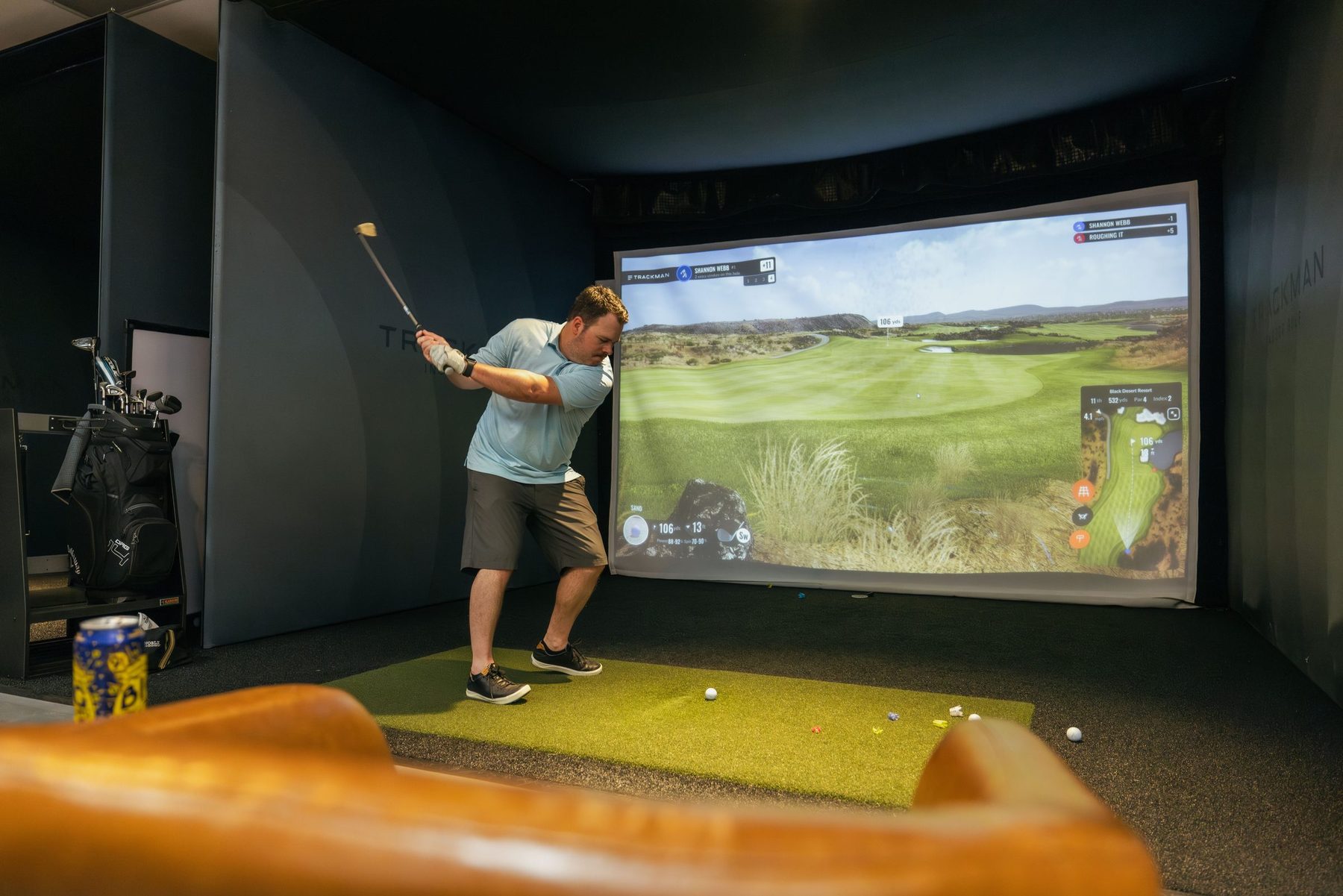 A golfer at the top of the backswing in NB2 Bay 5 at No Bogeys Laguna Niguel